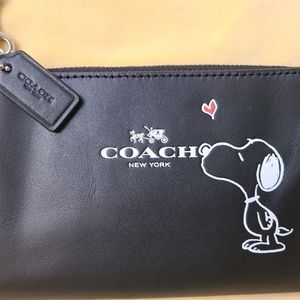 Cute COACH black leather corner zip wristlet with Snoopy & red heart. NWT!